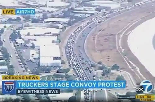 洛杉磯和長灘港卡車司機(jī)罷工開車游行連綿幾公里